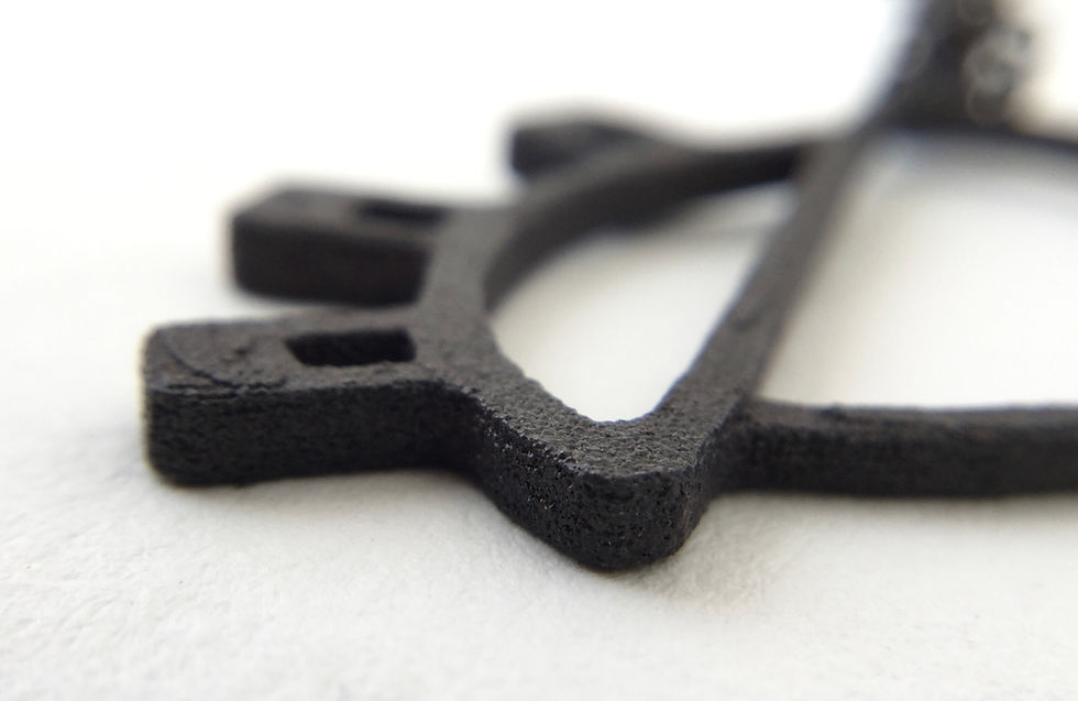 Thumbnail: Rough black steel makes for unusual jewelry