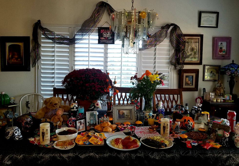 This shows our family altar with their favorite foods and photos to commemorate and celebrate