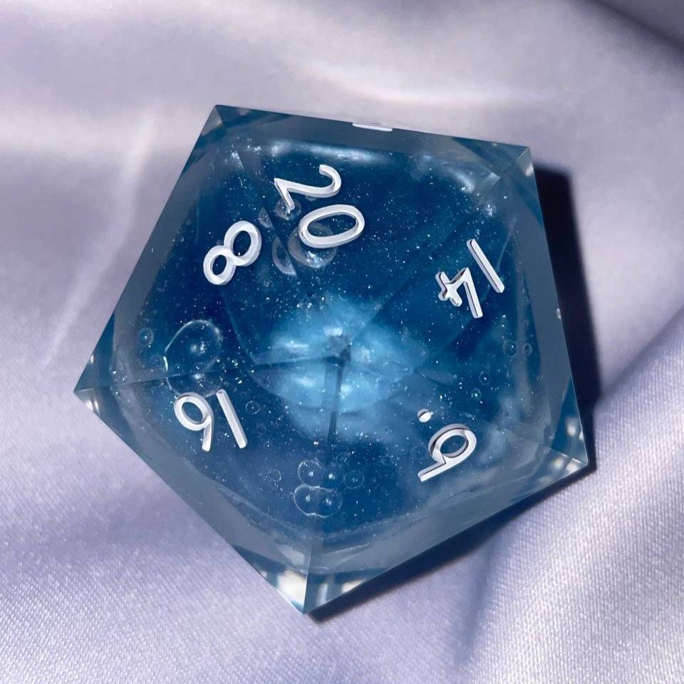 Thumbnail: A deep ocean blue liquid core d20 chonk with bubble effects
