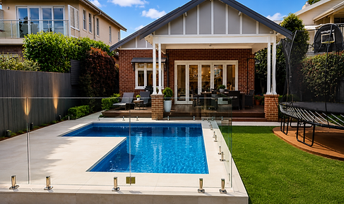 Custom concrete family pool designed for entertaining, relaxation and seamless outdoor living.