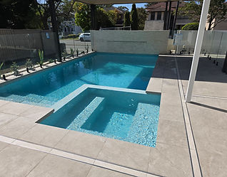 Luxury architectural concrete pool with integrated spa at Strathfield
