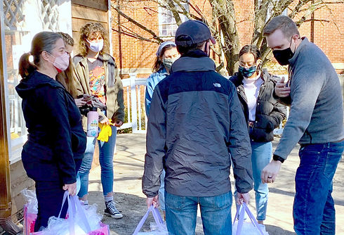 Volunteers distributing facemasks