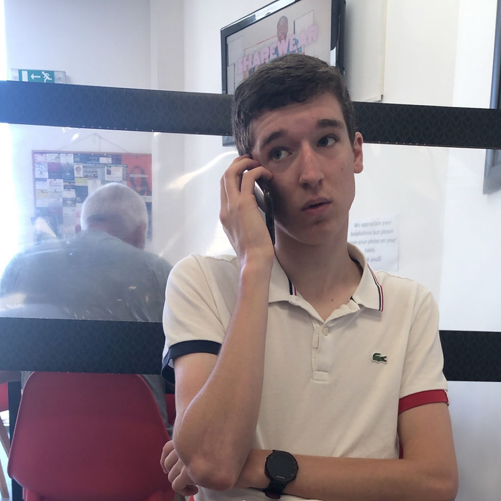 Fredo pictured above seen making a phone call to his Mummy (he is not happy because she has just told him he has to unstack the dishwasher tonight)