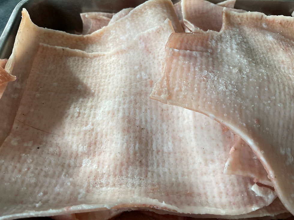 salted pork skin on a baking tray