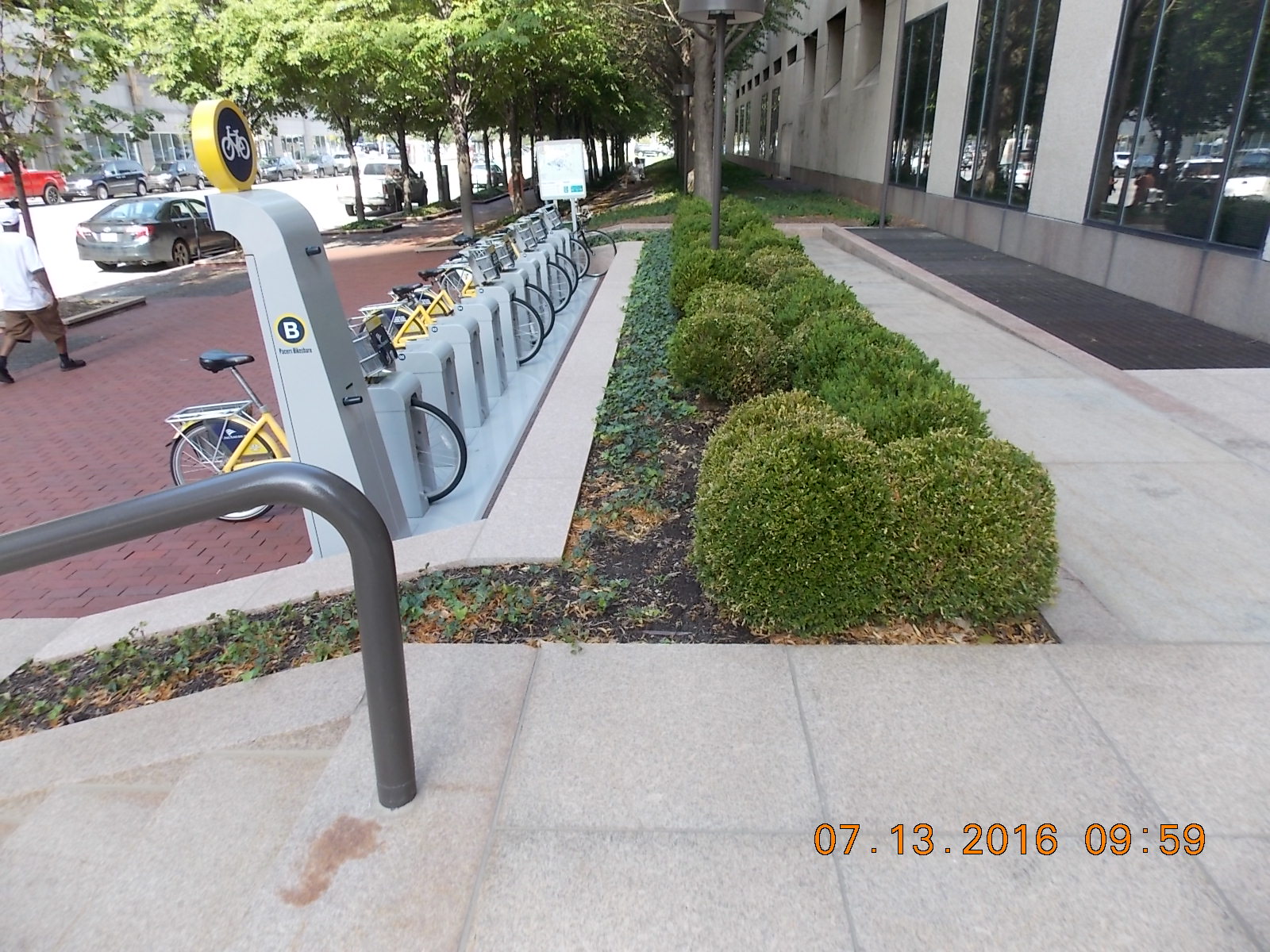 Reconfigured sidewalk in completion