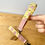 Thumbnail: Holding pig wristlet