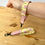 Thumbnail: Pig wristlet on wrist