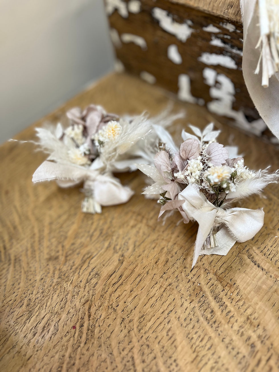 Dried Flower Boutonnieres with a silk ribbon bow