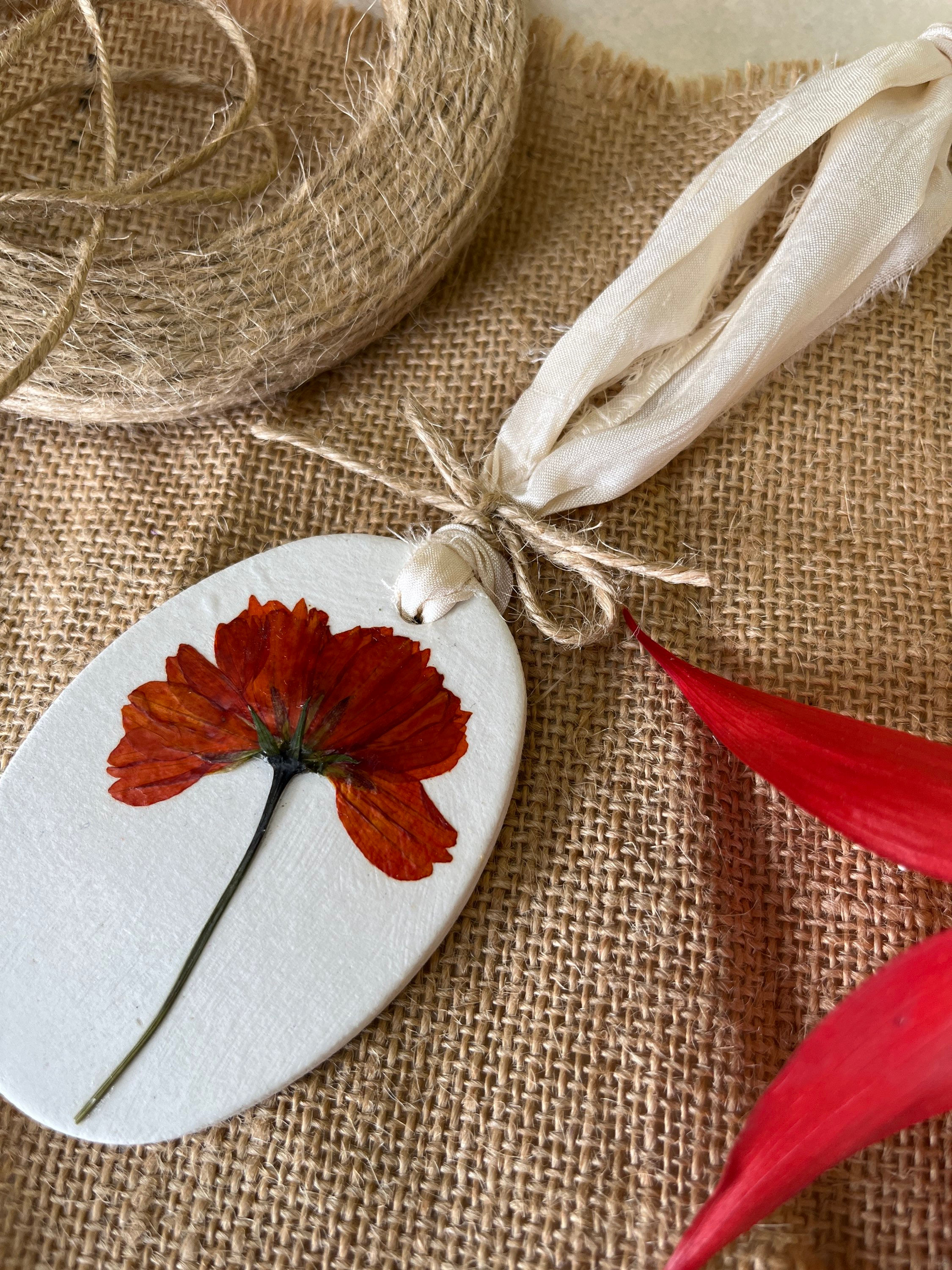 Ceramic Oval Pressed Red Cosmos Decoration