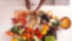 woman_slicing_vegetables_640107874.webp