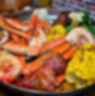 Low Country Boil catering with shrimp, snow crab legs, sausage, corn, and potatoes from The Crab Trap on Amelia Island
