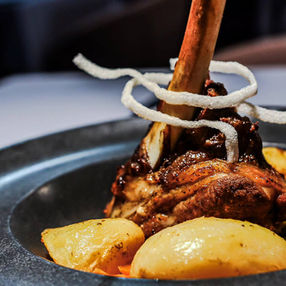 Traditional Kleftiko served on a plate at Molti Restaurant.
