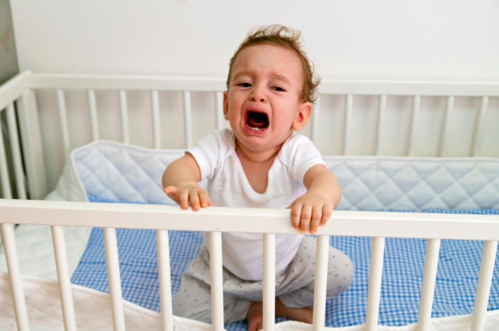 Baby crying in the crib