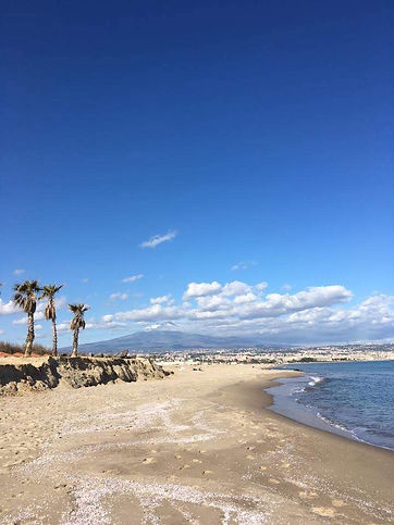 Catania’s Playa beach with Mount Etna in the background