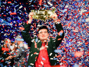 Aloysius Yapp Holding up trophy after winning the 2025 US Open Pool Championship
