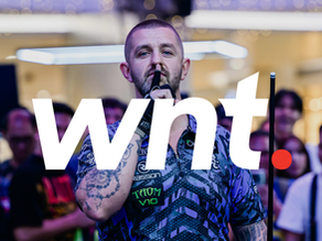 Photo of Pro pool player Jayson Shaw with World Nineball Tour Logo in white .