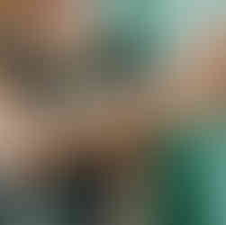 Physiotherapist performing manual therapy on a patient’s shoulder to reduce pain and improve mobility