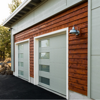 two unique garage doors with bold red wood