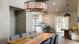 Dining room of a Sunriver vacation home remodel by PGC Building + Design