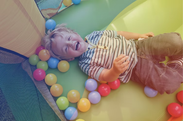 Kid in bounce house.png