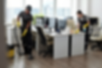 young-man-woman-using-detergent-vacuum-cleaner-cleaning-openspace-office_274679-35143