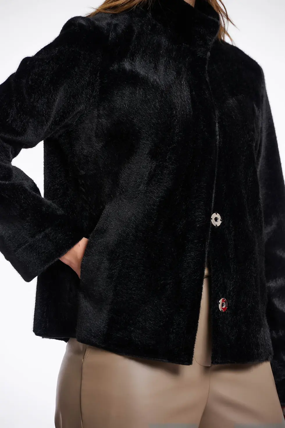 Rino Faux fur jacket black close-up showing pocket, sleeve and button details on model at Ava Boutique