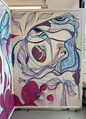 Mural of birds in blue and pink