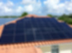 Solar panels on roof of a beautiful florida home.jpg