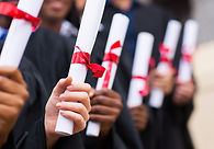 Graduates Holding Diplomas