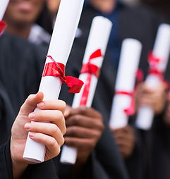 Graduates Holding Diplomas