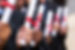 Graduates Holding Diplomas