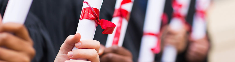 Graduates Holding Diplomas