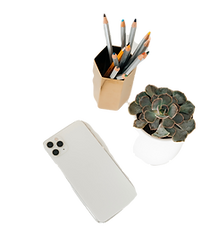 silver iphone 6 beside white ceramic cup