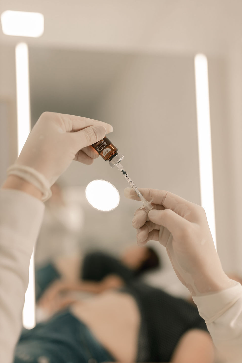 a doctor preparing mesolipo treatment