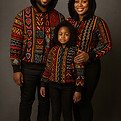 Family wearing matching hooded sweaters smiling, african fashion outfits. Jajex Apparel
