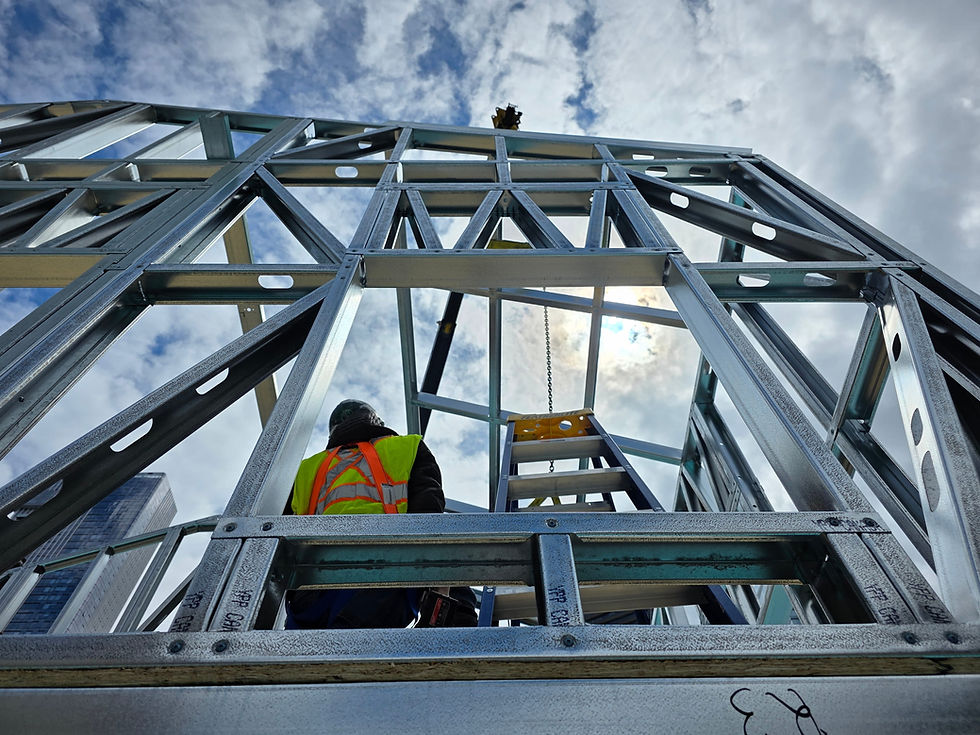 CFS (cold-formed steel) structural framing system with closely spaced vertical steel studs forming a repetitive wall or structural frame assembly