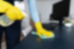 person-taking-care-office-cleaning