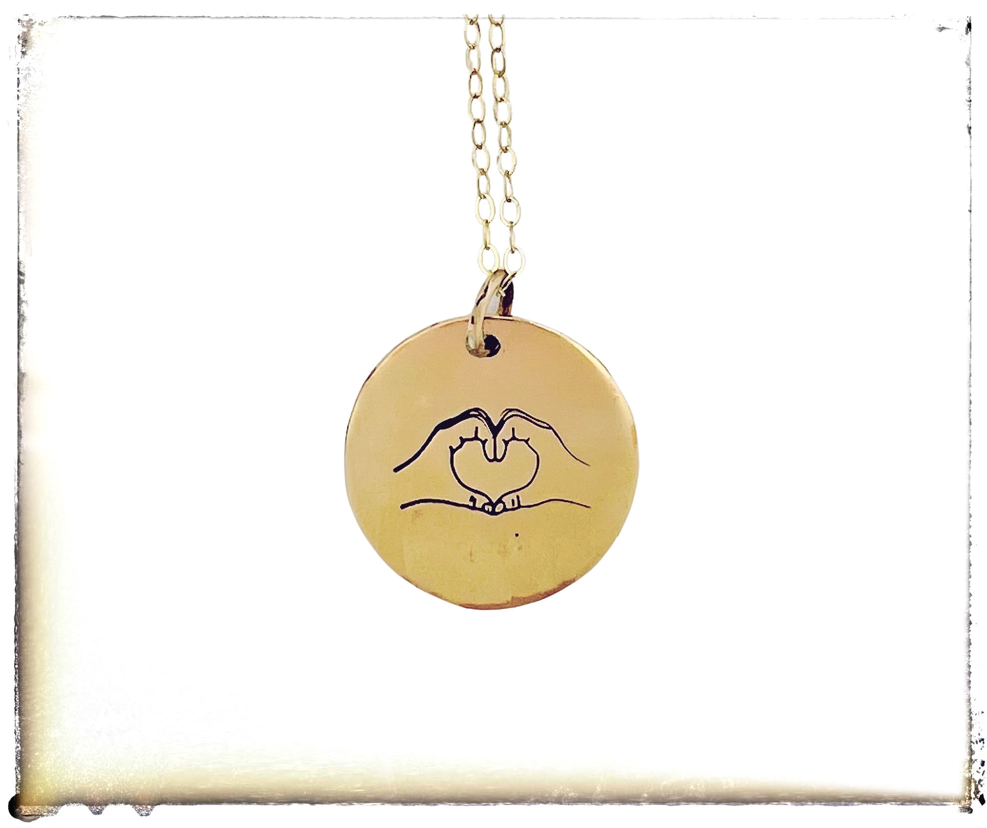 14kt Gold Hand Heart necklace 