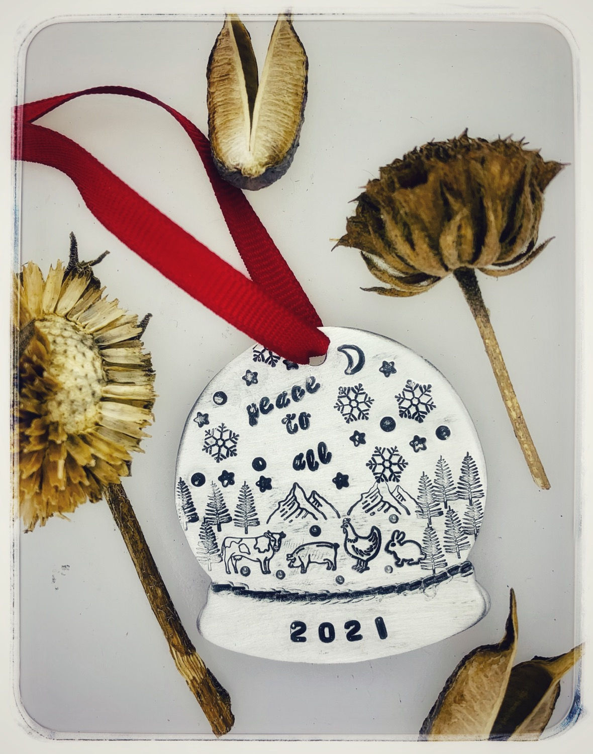 Peace to All Animals Snow Globe Ornament