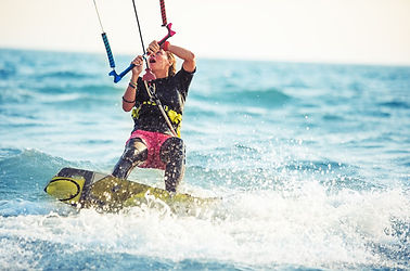 A guest learning the basic mechanics of kite handling during an introductory activity in Boracay. A foundational look at the water-based services curated by Pearl Horizon Travel.