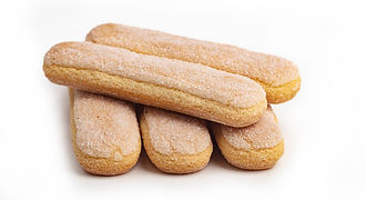 A stack of crisp Baclayon Broas, the famous light ladyfinger biscuits from Bohol, representing centuries of culinary tradition and local heritage for travelers.