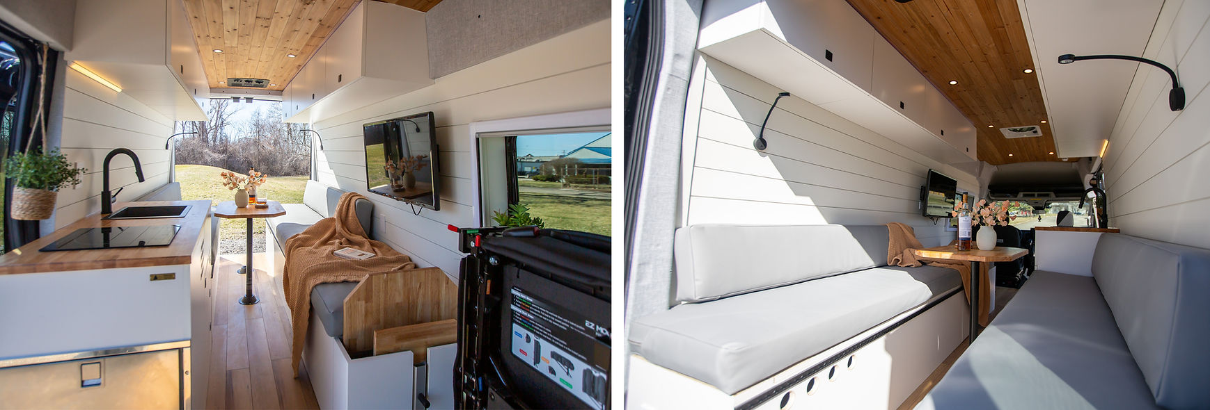 A custom build camper van with a large dinette at the back, a wall-mounted TV and a kitchen