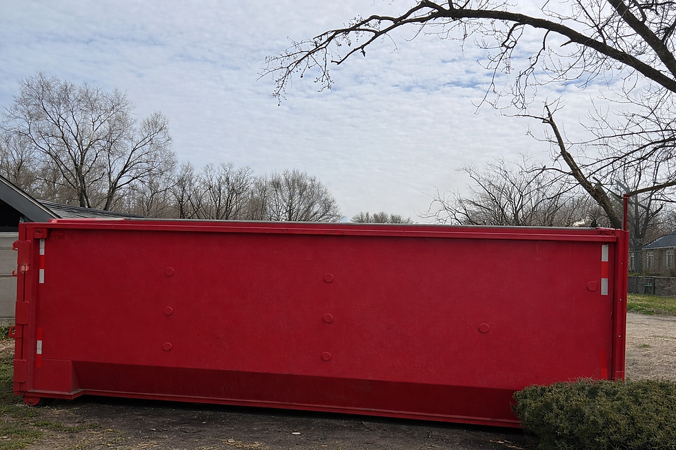 Bright red dumpster in residential area.png