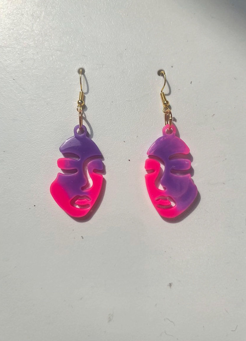 Pair of purple and pink abstract face earrings