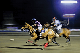 Doug-Barnes-goes-for-the-goal-with-Michael-Grams-in-hot-pursuit-Photo-by-Tony-Gibson for Middleburg Life