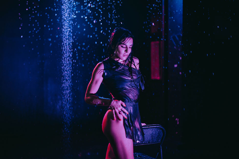 Woman dancing in the rain room