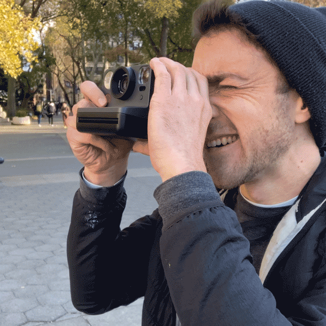 Taking Polaroids - Kevin Zych