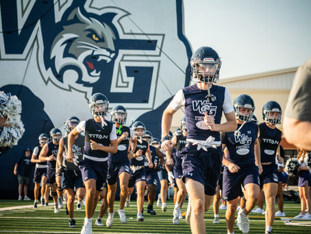 Walnut Grove Football running out of the Wildcats tunnel preparing for the 2025 practice palooza