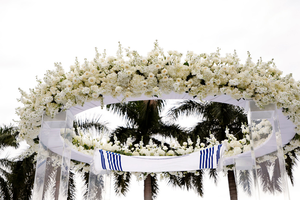 close up of round chuppah decorated with white flowers at Melissa Davis Designs wedding