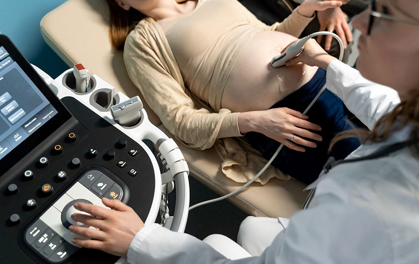 gynecologist-performing-ultrasound-consultation.jpg